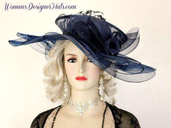 Ladies Navy Blue Sinamay Sheer Wide Brimmed Haute Couture Designer Hat, Avant Garde Hats, Hats For Formals Weddings Dress Up Events, Kentucky Derby Hats, Royal Ascot Hats, Derby Luncehon Tea Hats, Mother Of The Bride Hats, Dress Hats For Women, Ladies Church Hats, NYFashionHats.com, NY Fashion Hats Headwear Millinery Apparel Headdress, Cruise Ship Evening Hats Vacation, Casino Show Tickets Hat Parade Bets Betting Horse Racing Hats, High Fashion Hats In Navy Blue, Stylish, Style, Elegant