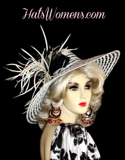 Beautiful Custom Made Black And White Wide Brimmed Ladies Designer Hat With A Large Sheer Black Crinoline Bow, Accented With Exotic White Feathers. This Elegant Hat Is Suited For The Kentucky Derby, Horse Races, Melbourne Cup, Royal Ascot, Garden Tea Parties, Weddings, Formals, Church, And Special Occasion.