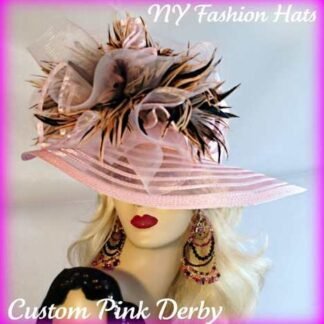 Ladies Soft Pink Designer Sheer Wide Brim Fashion Haute Couture Kentucky Derby Horse Racing Hat Embellished With Pink And Brown Striped Tiger Type Feathers. A Large Pink Horse Bow And A Pink Organza Bow With Pink Satin Edging Is Mixed Into The Feather Mix. This Romantic Styled Avant Garde Hat, Will Make Any Women Feel Feminine. This Dress Hat Is Suited For A Bride To Be On Her Wedding Day, Or For Wedding Guests. This Dress Hat Is Suited Also For Church, Weddings, Formals, Holidays And Special Occasions.