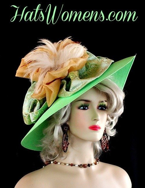 Ladies Lime Green Wide Brim Formal Fashion Kentucky Derby Hat. This Custom Made Women's Designer Hat Is Embellished With A Large Paisley Lime Green And Golden Yellow Paisley Embroidered Bow, Accented With A Gold Large Organza Bow. Ivory Feathers Are Placed Inside The Bow For Added Style. This Beautiful Designer Hat Is Suited For A Bride To Be On Her Wedding Day, Horse Races, The Kentucky Derby, Breeder's Cup, Maryland Million Day, Iroquois Steeplechase Horse Races, The Melbourne Cup, The Royal Ascot, Church, Weddings, Formals, And Special Occasion. This Fashion Hat Is Custom Made By Women's Hats, hatswomens.com.