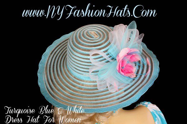 Ladies Wide Sheer Brim Custom Made, Turquoise Blue And White Special Occasion Kentucky Derby Hat. This formal designer Church hat, is adorned with a sheer large turquoise blue and white netting bow, adorned with a beautiful, custom made pink silk rose flower, accented with turquoise blue satin rosettes and pink feathers. The edge of this wide brim hat, has a scallop lace finish.