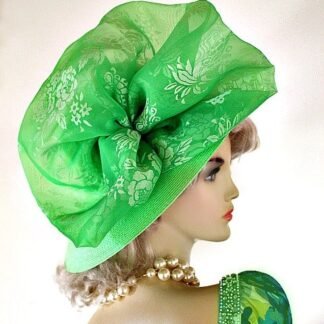 Ladies Lime Green Wide Brim Fashion Kentucky Derby Hat. This dress hat is adorned with a large lime green sheer organza fabric bow with a beautiful pattern. This is a custom made hat. This dress hat is suited for Winter, Spring, Summer And Fall. A perfect special occasion hat for weddings, formals, Church, horse races, the Kentucky Derby, and holidays.