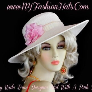 Ladies Ivory Wide Brim, Custom Made, Church Kentucky Derby Hat. This ivory designer hat, is adorned with a pink silk rose flower, with an ivory sequin hat band. This beautiful hat, is available in black, ivory or turquoise blue. Customize your choice of rose flower colors. This hat will make a fashion statement. This fashion hat, can be worn for casual attire or dress attire. This gorgeous, dressy hat, can add a touch of elegance to your favorite dresses, suits, gowns, or pants suits. What a great millinery accessory, to wear to a museum Art exhibit opening.